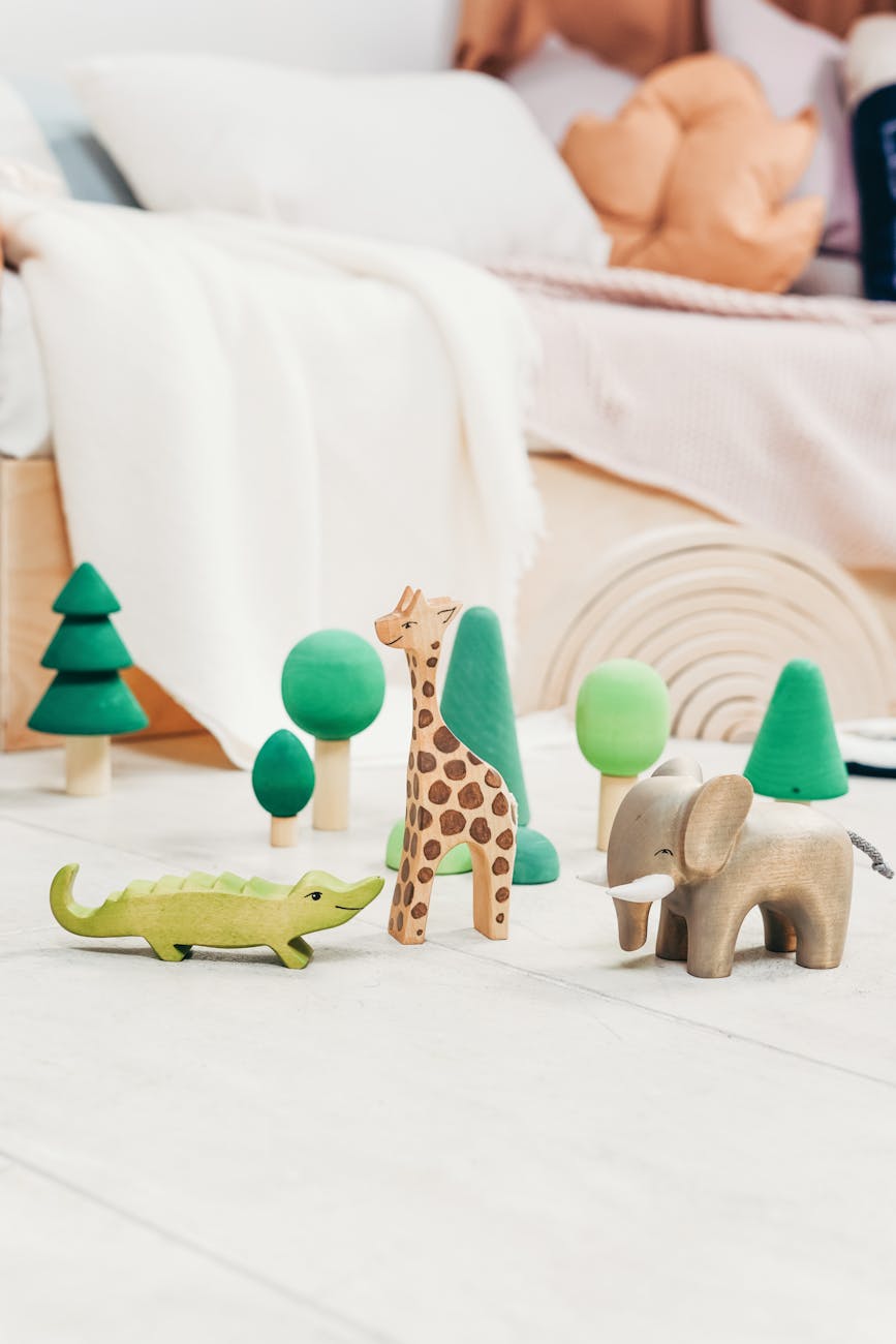 green crocodile wooden toy on the floor